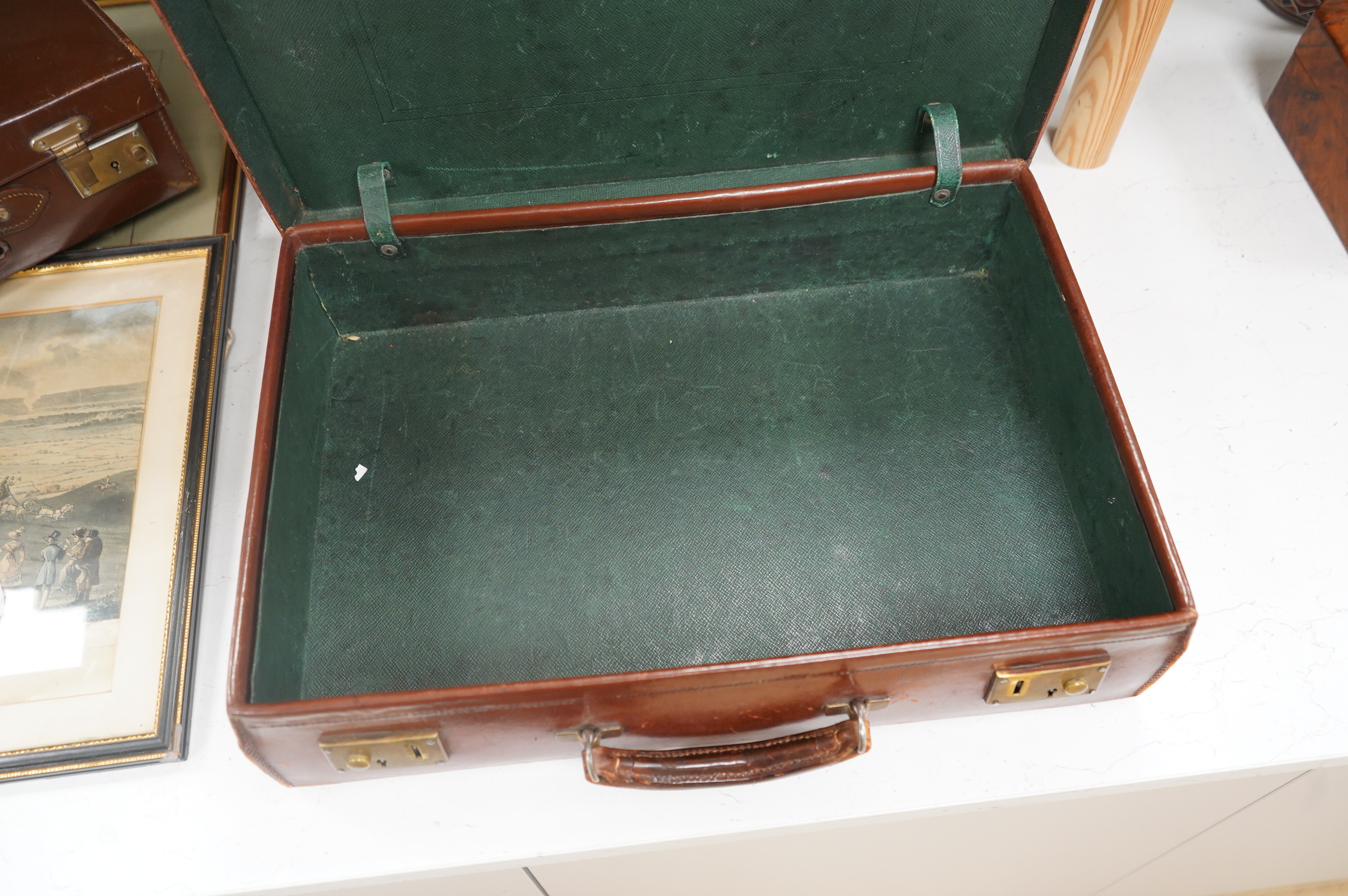Three small vintage leather cases, largest 45cm wide